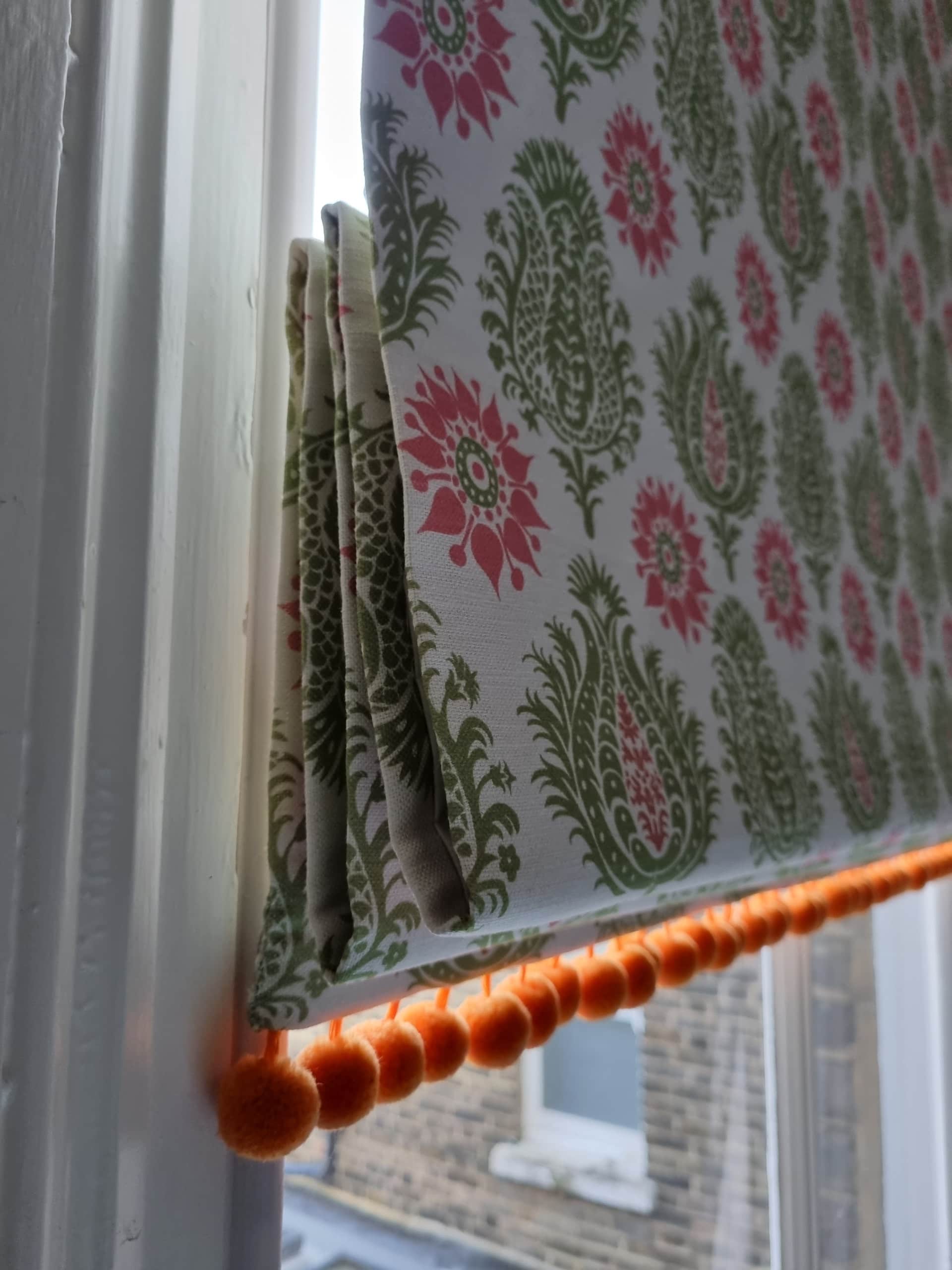 Made to measure roman blind in Charlotte Gaisford fabric and pom pom trim