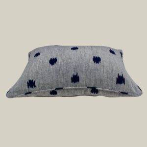 A pillow with a Blue Ikat pattern.