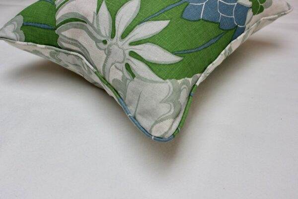 A Christopher Farr - Carnival Green floral pillow.